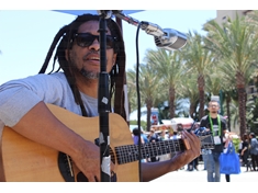 Local guitarist plays for SIGGRAPH in front of the Anaheim Convention Center.