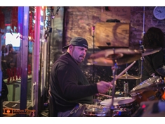 Tommy Ray, drummer of Rayla Ray and The Texas Ray-Von Band on his DW drumkit with a Zildjian A custom 16&quot; fast crash, Zildjian A custom 14&quot; crash, Sabian 20&quot;  ride, Zildian 14&quot; Hit-Hats Mastersounds, Zildjian 18&quot; rock crash, Zildjian 16&quot; medium crash, Zildjian 16&quot; china, Tama Iron Cobra Power Glide Double Petal, DW 5000 single petal, Roc-N-Soc throne, Kick Port in kick drum head, Remo Weatherking Emperor X 14&quot; snare batter head, Evans G2 heads on all toms, and Roland DB90 click track.