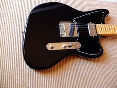 I have changed the bridge pickup since taking this photo - this one was a Broadcaster style pickup with cloth wrapped wire, etc. I swapped it out for a hum-cancelling stack.