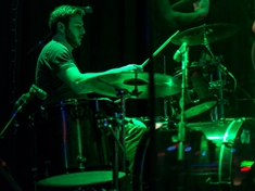 Behind the glass shot of me playing with Jordan Crosby and the Shades of Blue on December 21, 2013 at Birdies in Indianapolis, IN. From what we were told, the sound was great that night. Photo by Aaron Pierce.