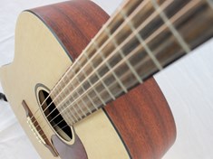 I love the look of this guitar because of the contrasting front color of the wood and the side and back darker color.